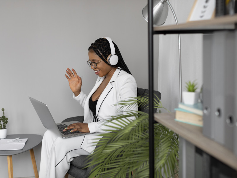 medium-shot-woman-working-with-laptop